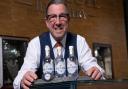 Steven Coll with his Isle of Col Gin bottles