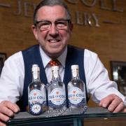 Steven Coll with his Isle of Col Gin bottles